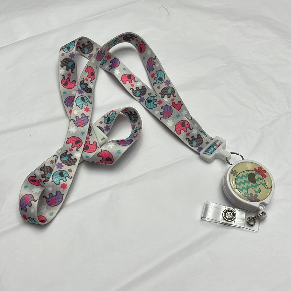 NWOT break away lanyard/badge real , pastel elephants, pediatric